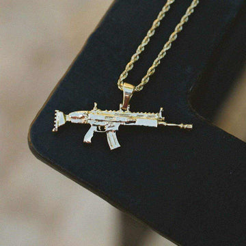 Colgante de oro macizo de 10k con forma de fusil SCAR