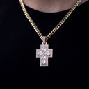 Cruz de baguette con diamante central