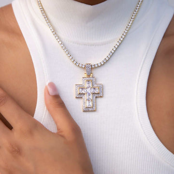 Cruz de baguette con diamante central
