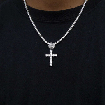 Cruz con diamantes en oro blanco